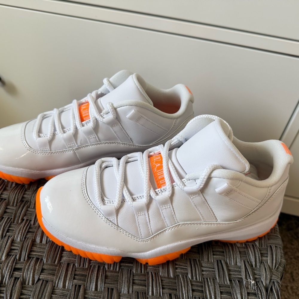 Women’s Jordans White and Orange Sneakers